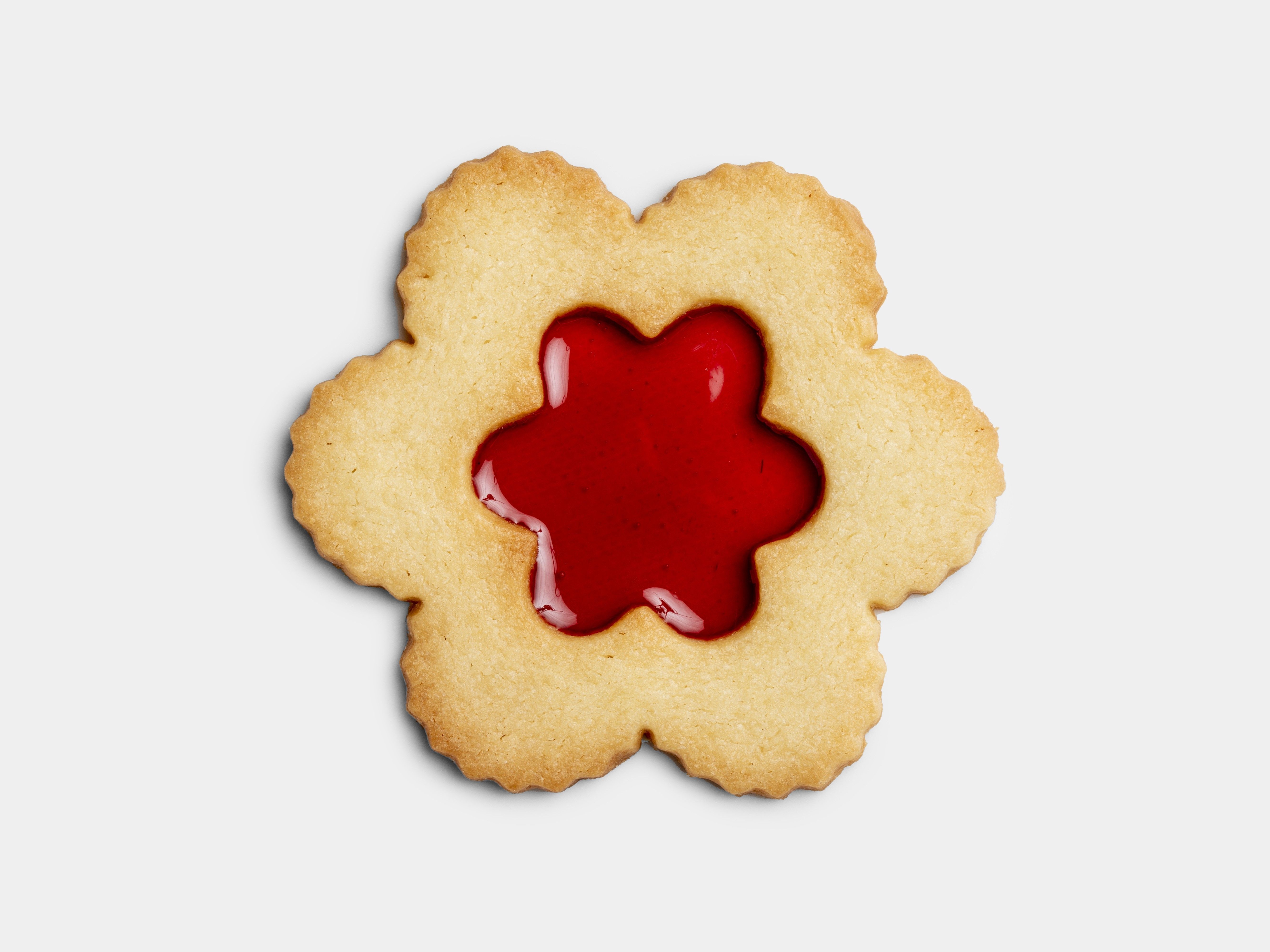 Flower shaped biscuit filled with jam