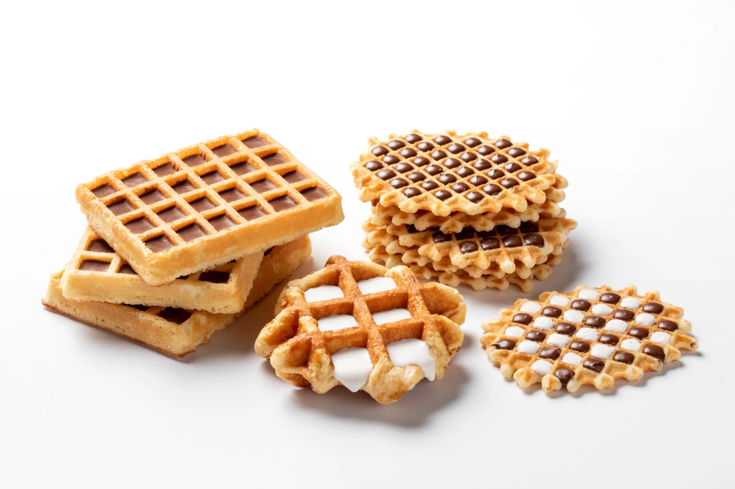 Various types of topped waffles cavity filled by FoodJet chocolate depositor