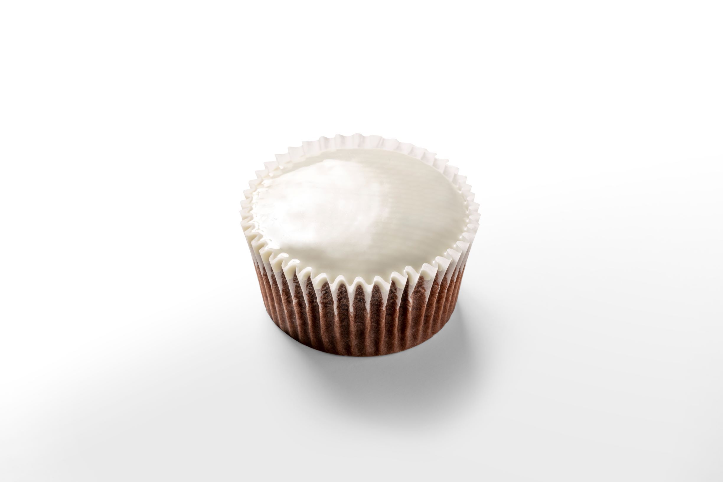 Cupcake covered with white chocolate by FoodJet chocolate depositor