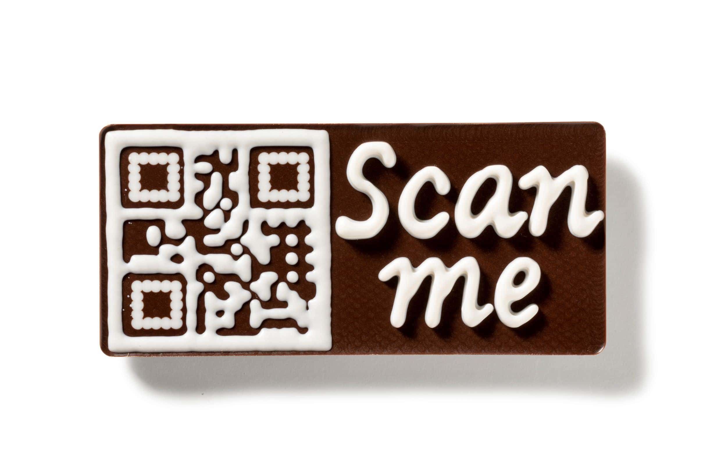 Milk chocolate bar with 3D QR-code printed in white chocolate by FoodJet tempered chocolate depositor