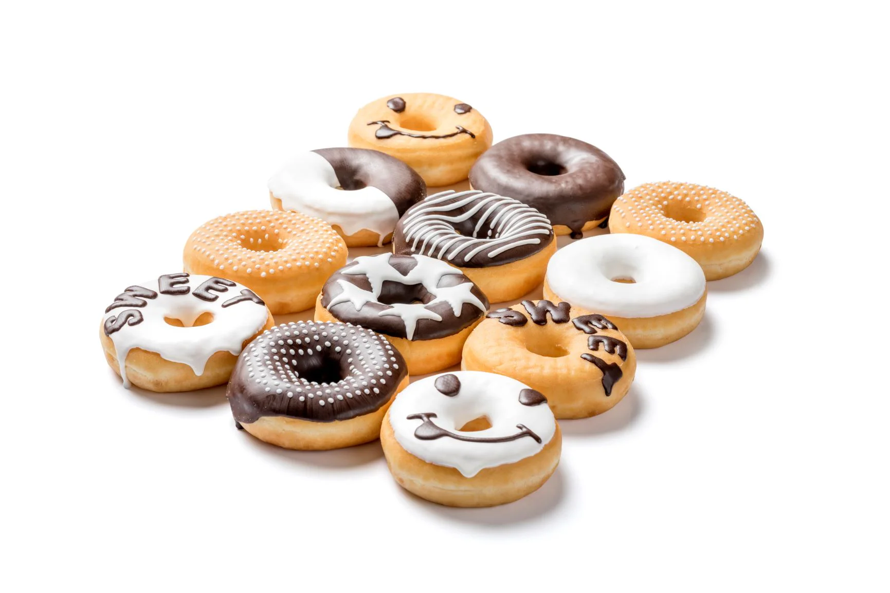 12 donuts with different chocolate decorations made with a FoodJet chocolate depositor