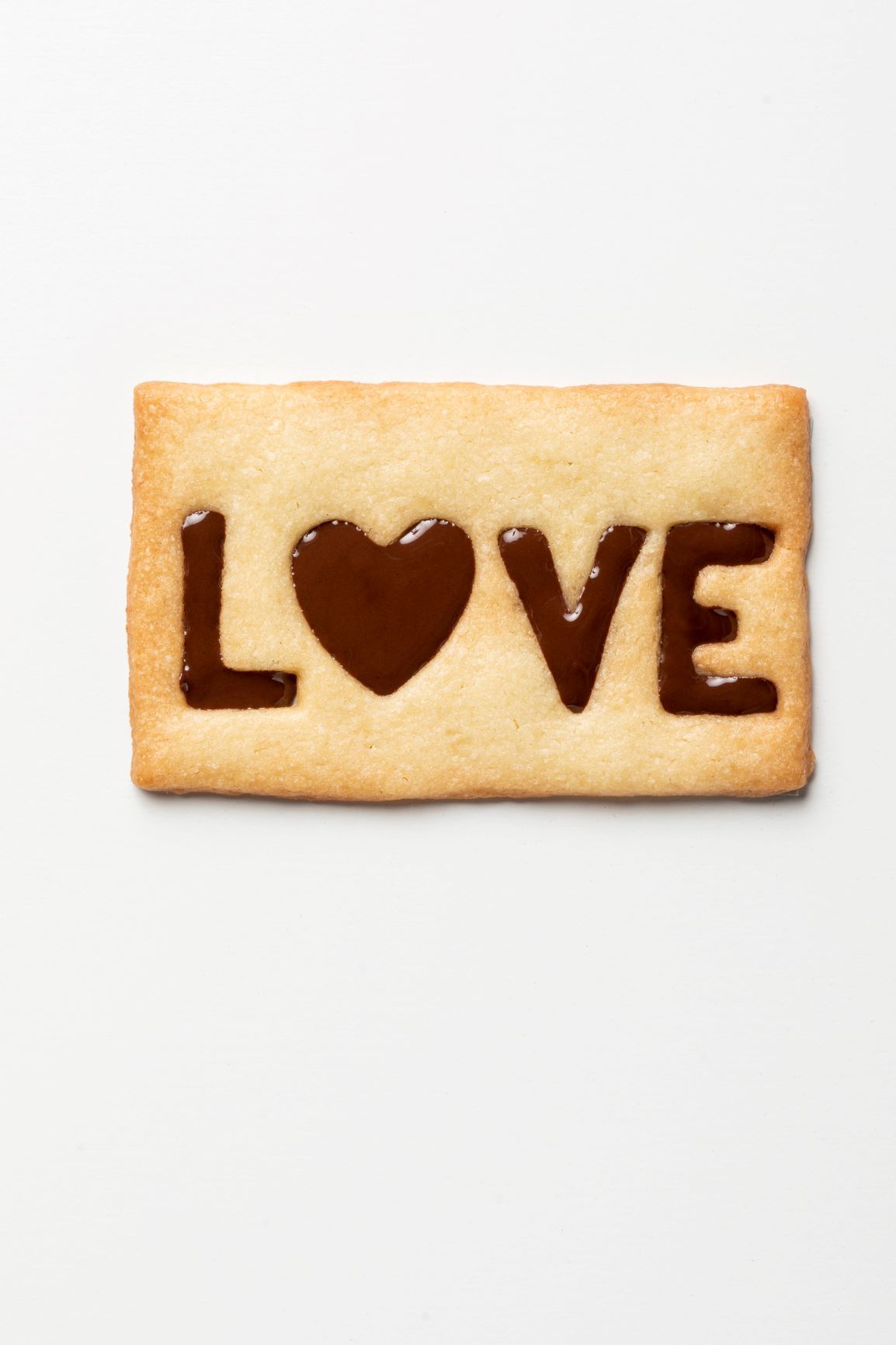 Cavity filled Love biscuit made with FoodJet chocolate depositor