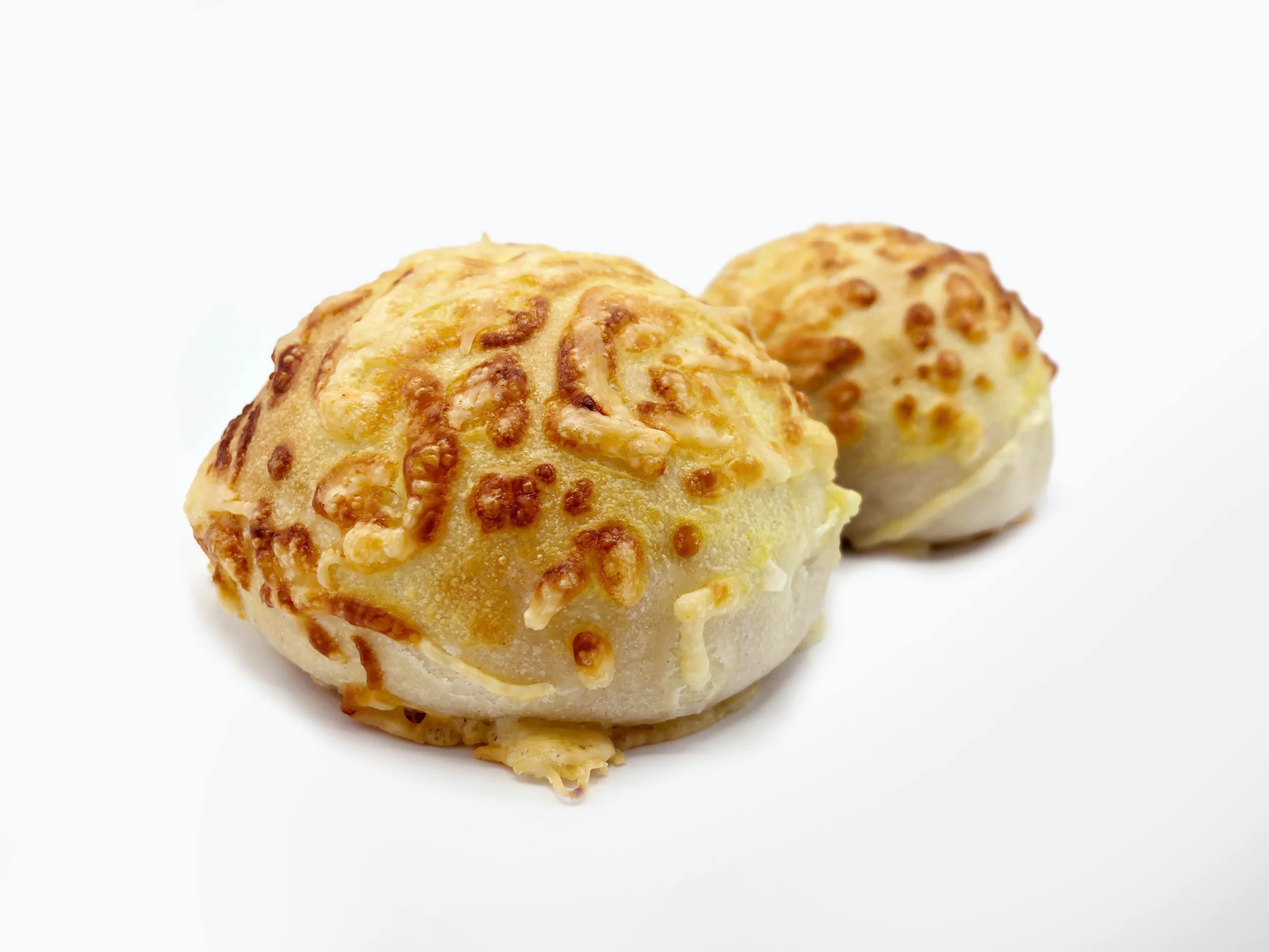 Buns topped with cheese