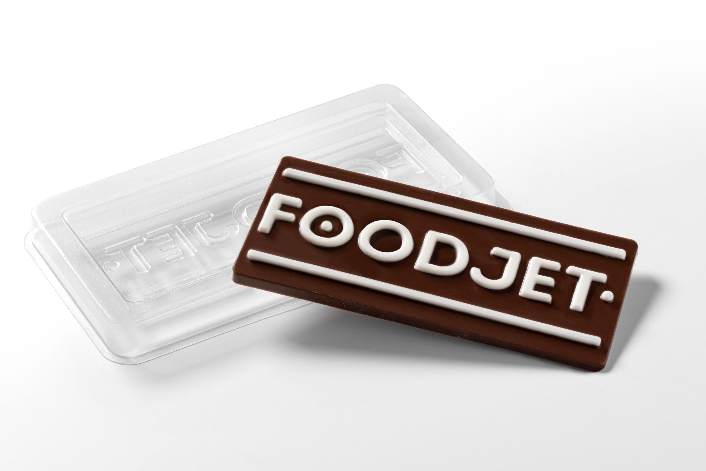 Milk chocolate bar with white cavity filled chocolate print by FoodJet chocolate depositor