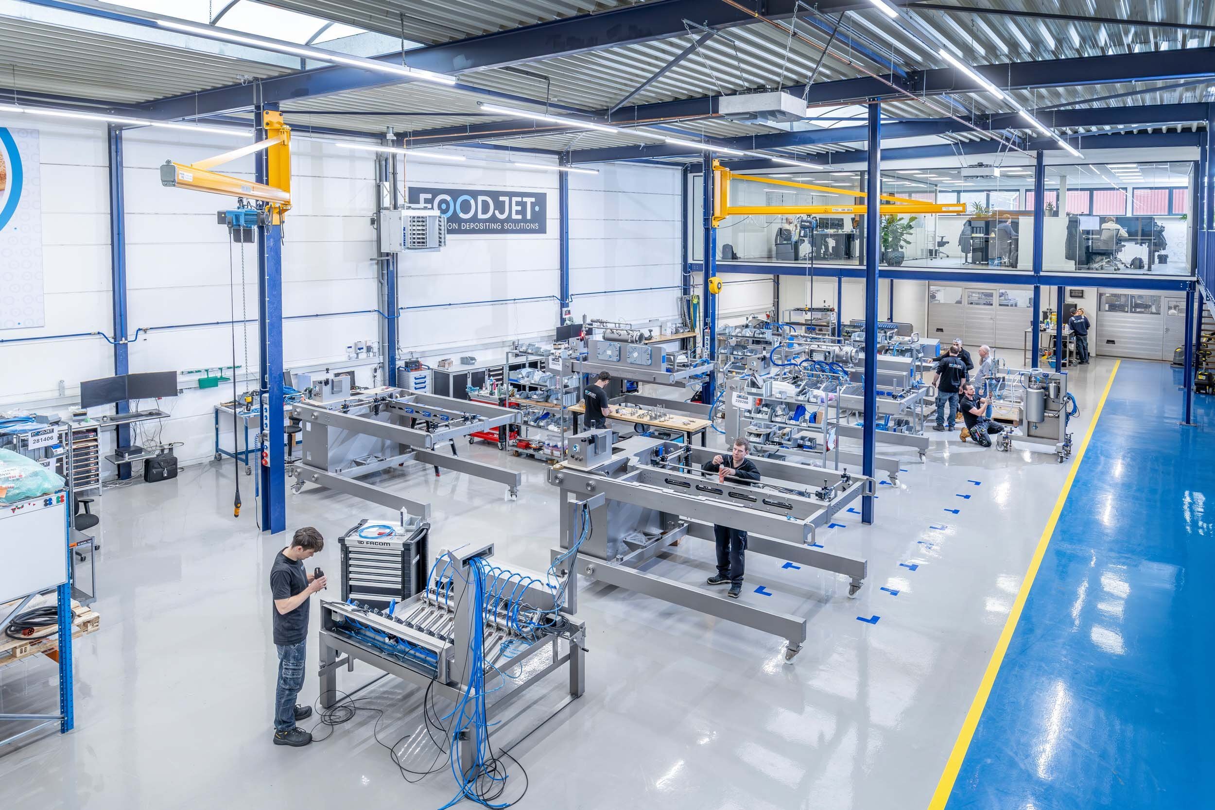 FoodJet assembly hall with depositors being built