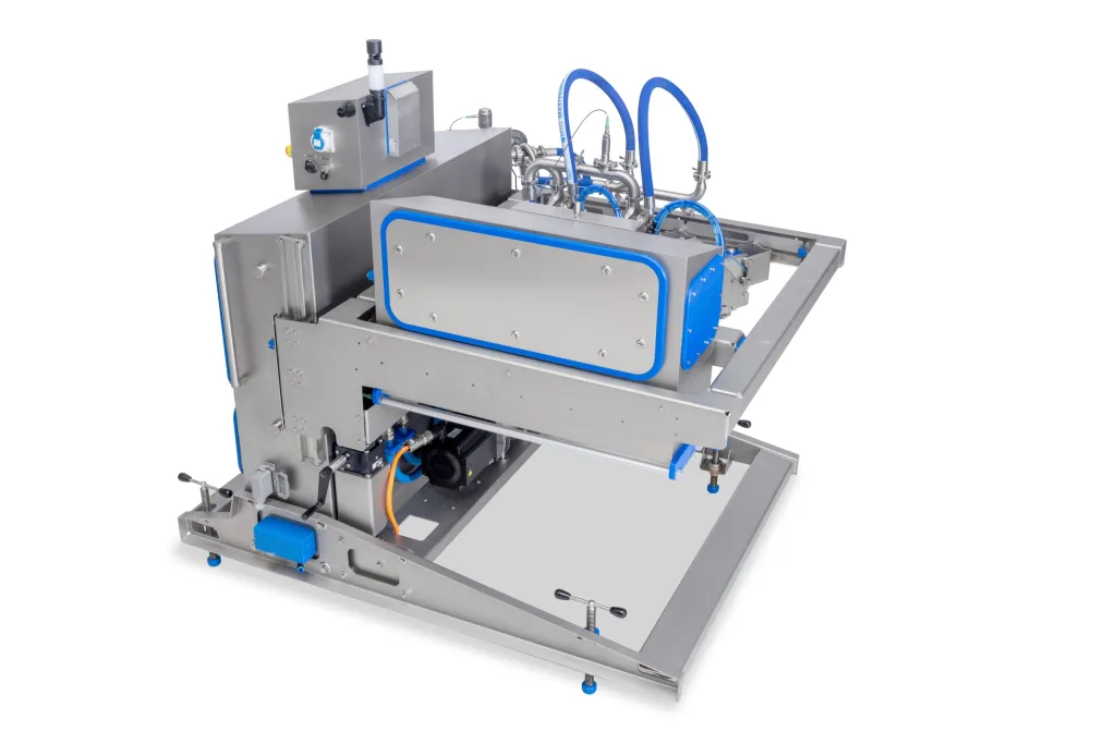 FoodJet MDM600 depositing machine with a stainless steel frame and blue trim, front side view